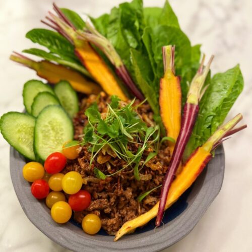 Laab Seasoned Beff with Cucumber, cherry tomatoes, carrots.